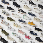 Assorted brand new sneakers and shoes flat lay
